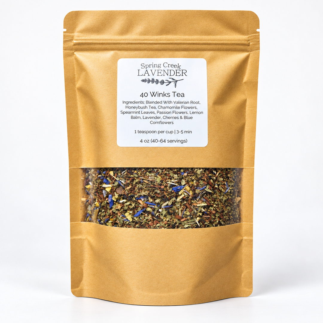 Spring Creek Lavender 40 Winks Herbal Tea in a gold 4 oz resealable pouch with a clear window showing dried herbs and colorful flower petals.