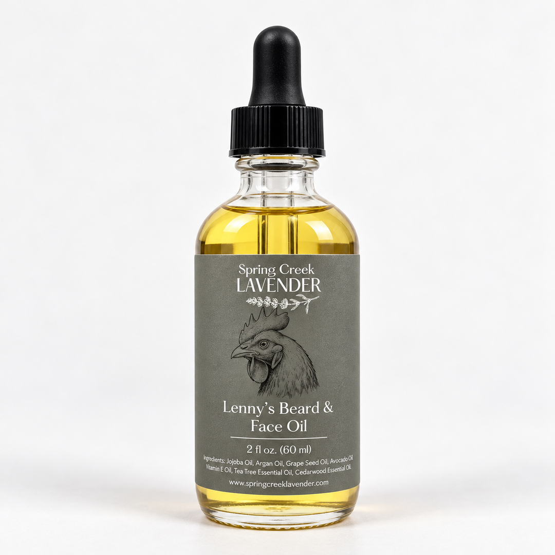 Spring Creek Lavender Lenny's Beard & Face Oil in a 2 oz clear glass dropper bottle with gray label, rooster illustration, and black cap.