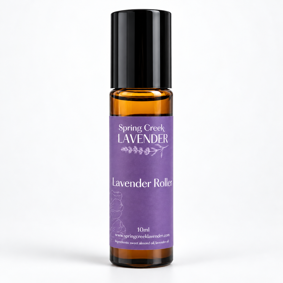Spring Creek Lavender Essential Oil Roller in a 10 ml amber glass roll-on bottle with a purple lavender label and black cap.