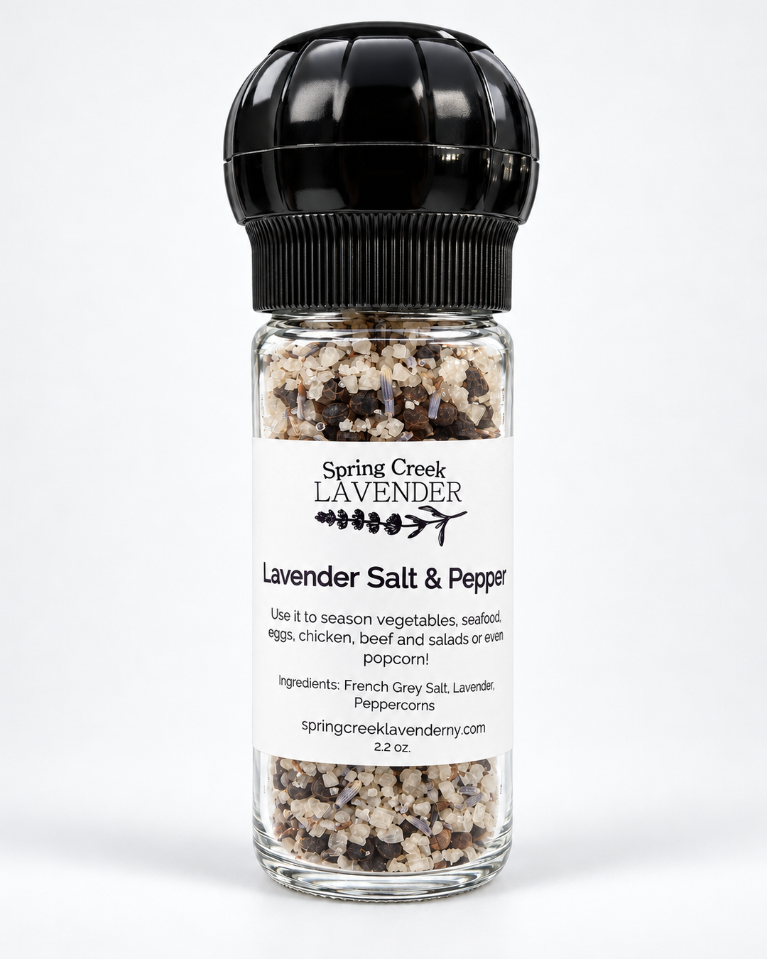 Spring Creek Lavender Salt & Pepper in a 2.2 oz clear glass grinder with black top, containing French Grey Sea Salt, peppercorns, and lavender.